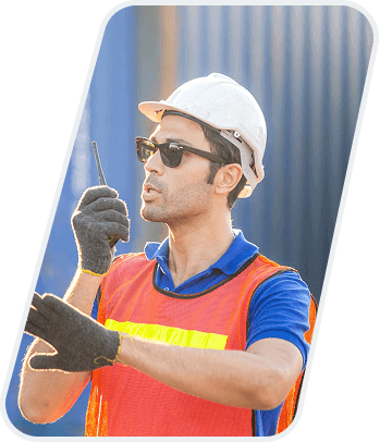 Container yard worker coordinating operations